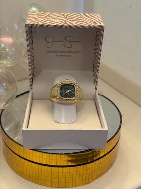 Jessica Simpson Gold-Tone Square Ring Watch with Black Dial and Crystal Accents